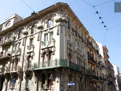 La sua mano si caratterizza per le ricche citazioni storiche e una spiccata individualit� mirata a un rinnovamento e ammodernamento dell�immagine cittadina. Questo si nota nel sostanzioso decorativismo con sfumature liberty del palazzo in via Crisanzio 97...